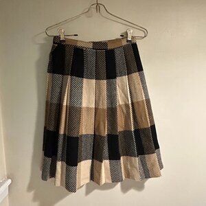 Black, tan, and cream plaid vintage knee length pleated wool skirt